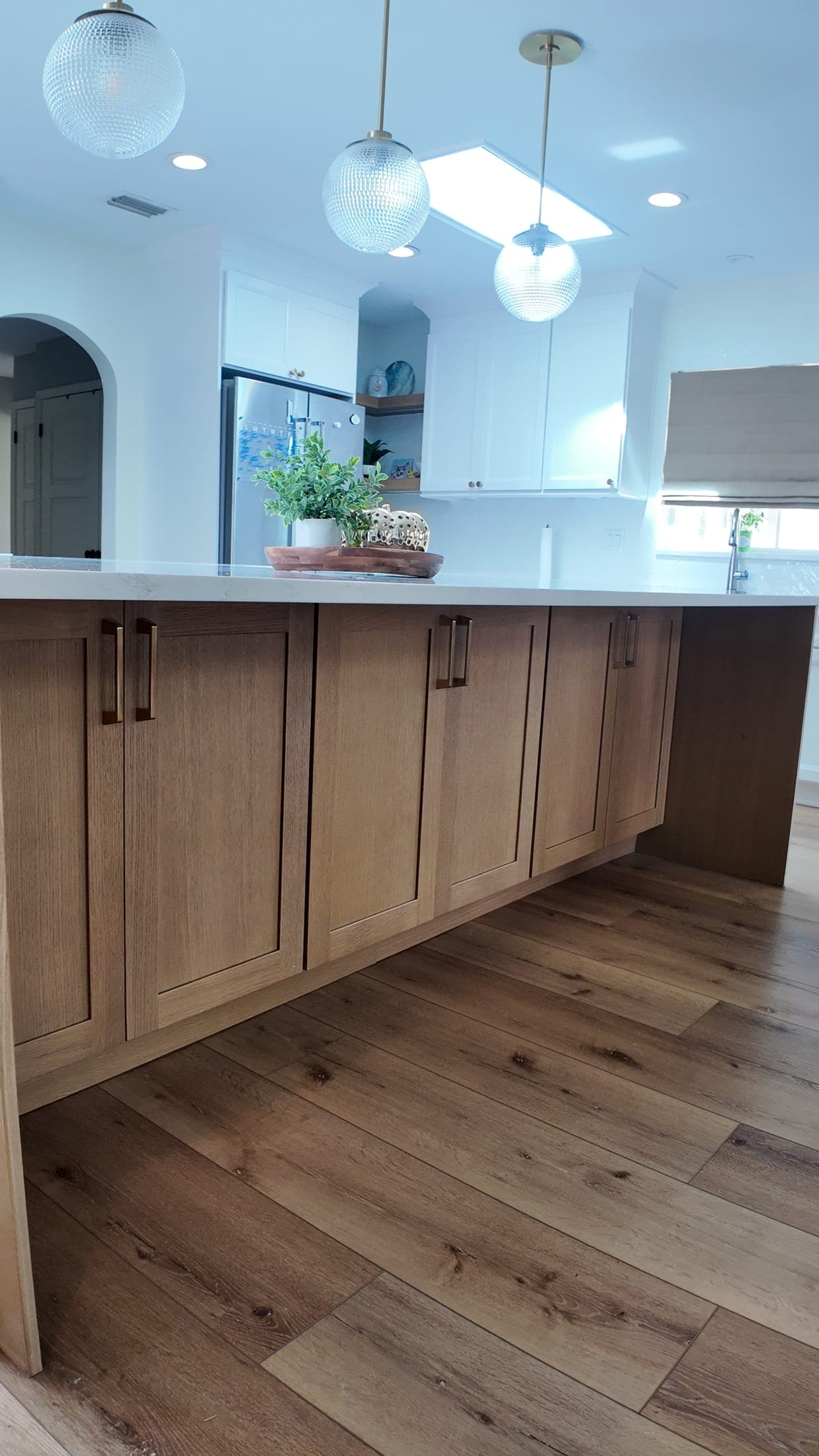 CI2V custom white-oak kitchen island detail in an Orlando home